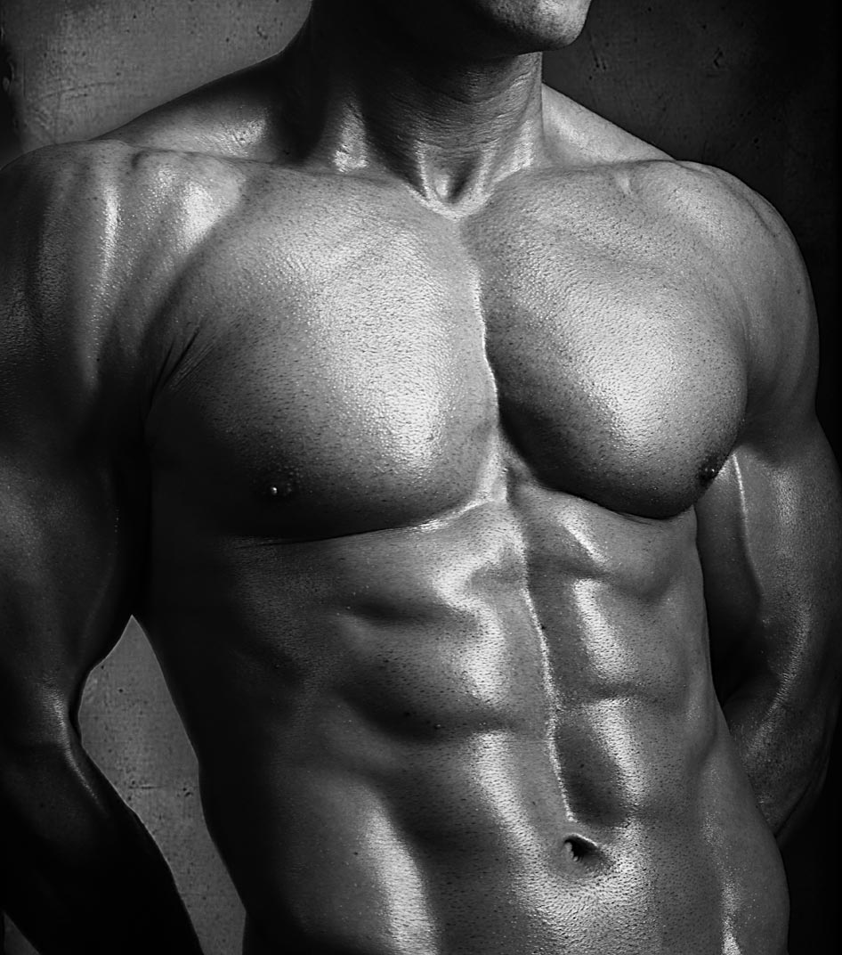 High contrast photo of bodybuilder with muscular torso