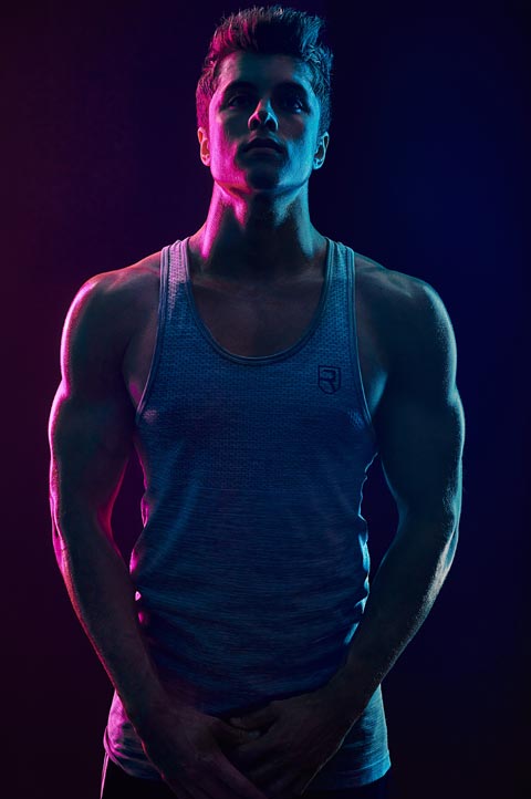 Dramatic lighting on photo of athletic male model